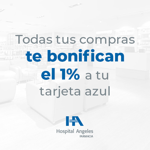 Edificio de cristal de 22 pisos, logo de Hospital Angeles blanco hasta arriba, cielo azul y atardecer anaranjado a un costado.