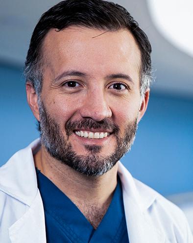 Es la foto de perfil de un pediatra, especialista en oncología médica en Huixquilucan. Tiene el cabello negro. Está sonriendo. 