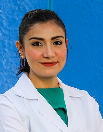 Es la foto de perfil de una pediatrá especializada en neurología pediátrica de Hospital Angeles León. Usa una bata blanca y una blusa verde. 