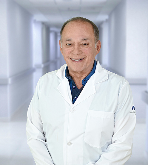 Es la foto de perfil de un anestesiólogo en Ciudad Juárez de Hospital Angeles Ciudad Juárez. Viste un traje de color gris, una camisa blanca y una corbata roja.